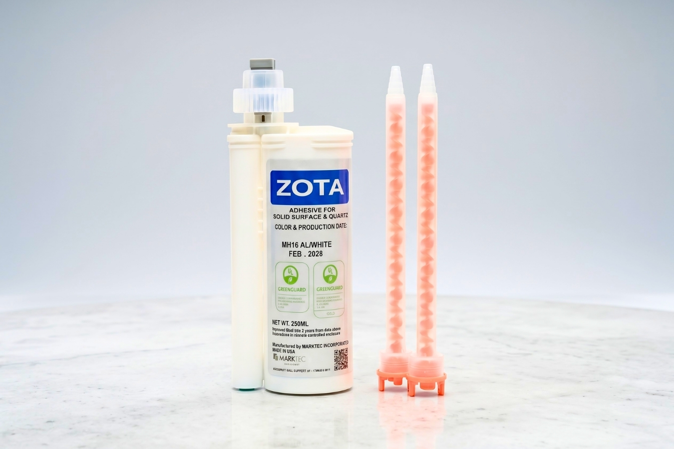 ZOTA GREENGUARD certified adhesive for solid surface and quartz countertops; eco-friendly bonding glue with mixing nozzles for professional kitchen and bath manufacturing.